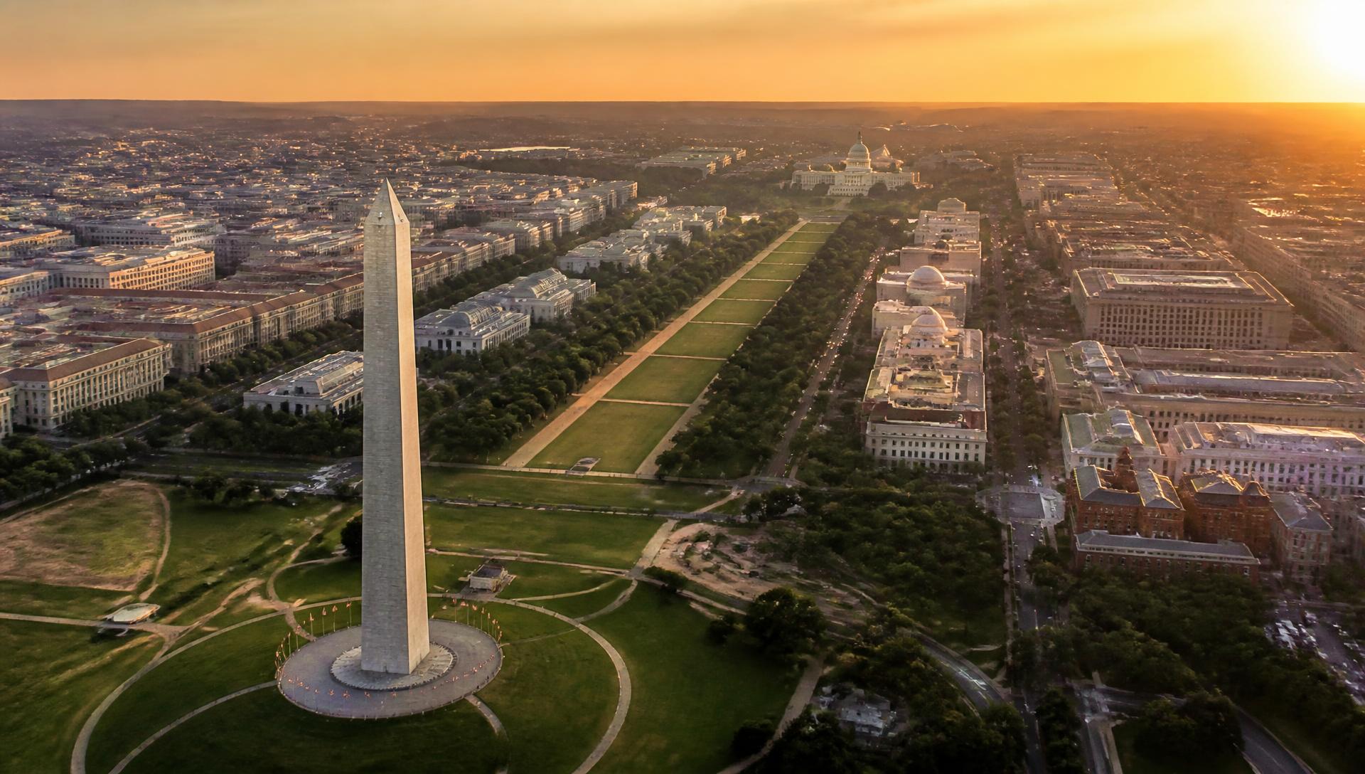 Aerial view of the Washington Monument and the National Mall at golden hour